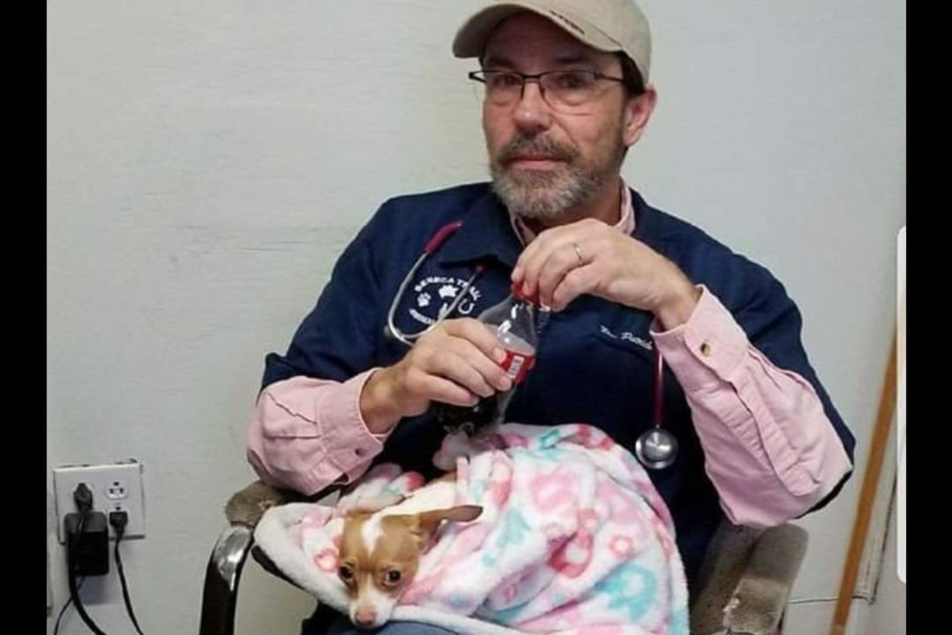 man sitting with dog